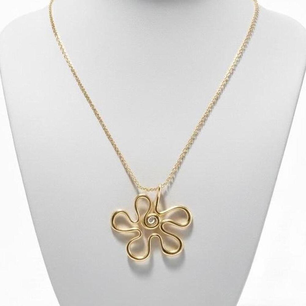 Gold flower necklace with a